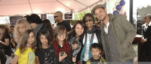 Maya Chambers with her father and mother and four siblings